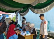 Kapolsek Muara Kuang Giat Hadiri Pemeriksaan Golongan Darah dan Pelayanan Dalam Rangka Hari Kesehatan Nasional di UPT Puskesmas Tambang Rambang 